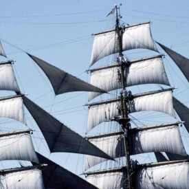 Tall Ship with sails billowing in the wind