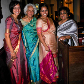 Wedding guests dressed in traditional Indian sari dresses